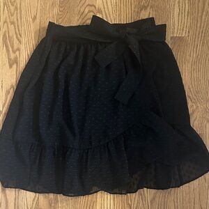 Black Women's Skirt. Michael Kors. Size small. Wrap skirt. Swiss dot